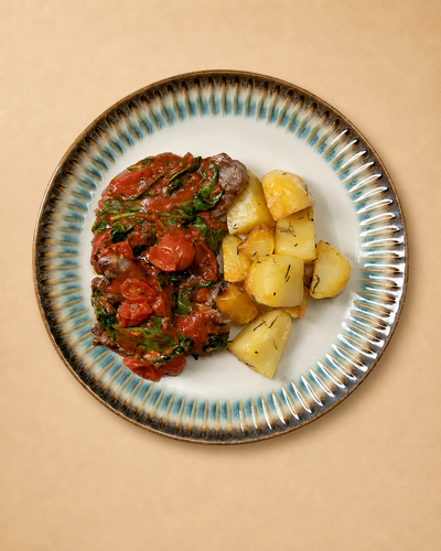 Scaloppine with Arugula and Sautéed Cherry Tomatoes