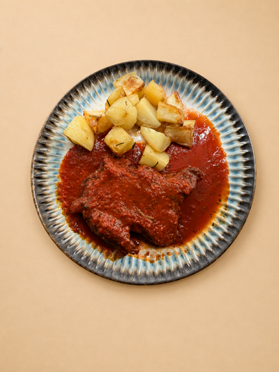 Filete a la Pizzaiola con papas al horno